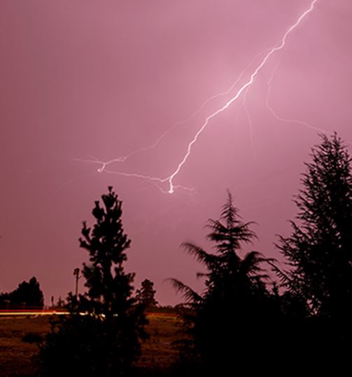 LIghtning in a pinkish sky