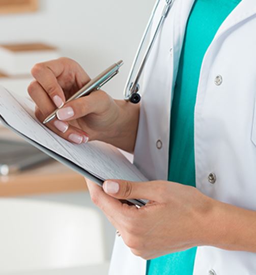 Doctor writing a note